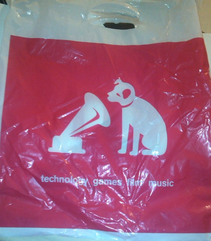 The HMV dog is listening to St James' Infirmary by Louis Armstrong. The HMV dog is trying to be ironic, in the hope that it will make death easier. The HMV dog is deluded.